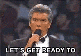 A man in a tuxedo holds a microphone and says, "LET'S GET READY TO" in bold text, preparing to make an announcement at a live event.