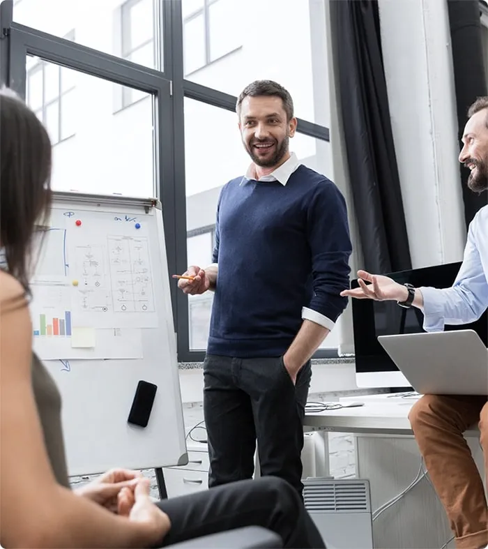 /wp-content/uploads/2025/05/team-leader-whiteboard-business-strategy-1.webp